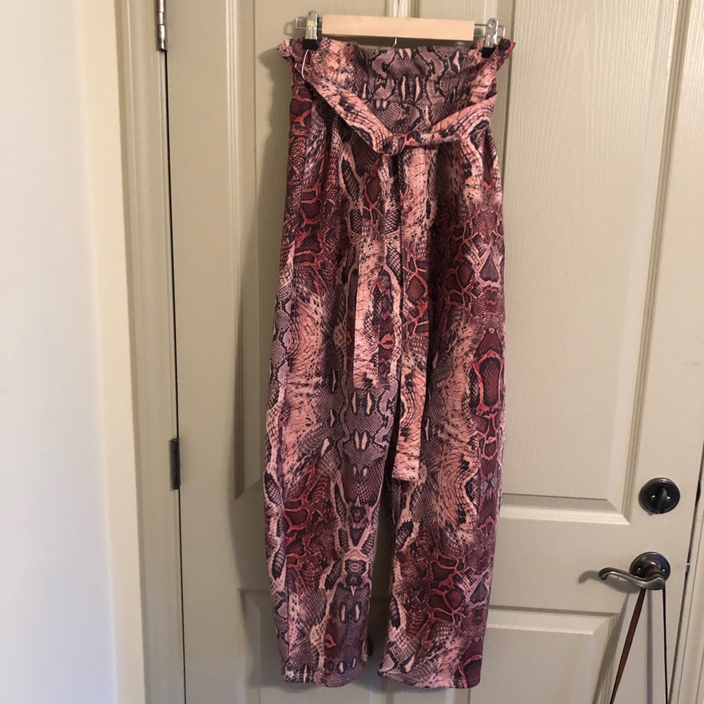 Urban Outfitters pink snakeskin pants - size 2